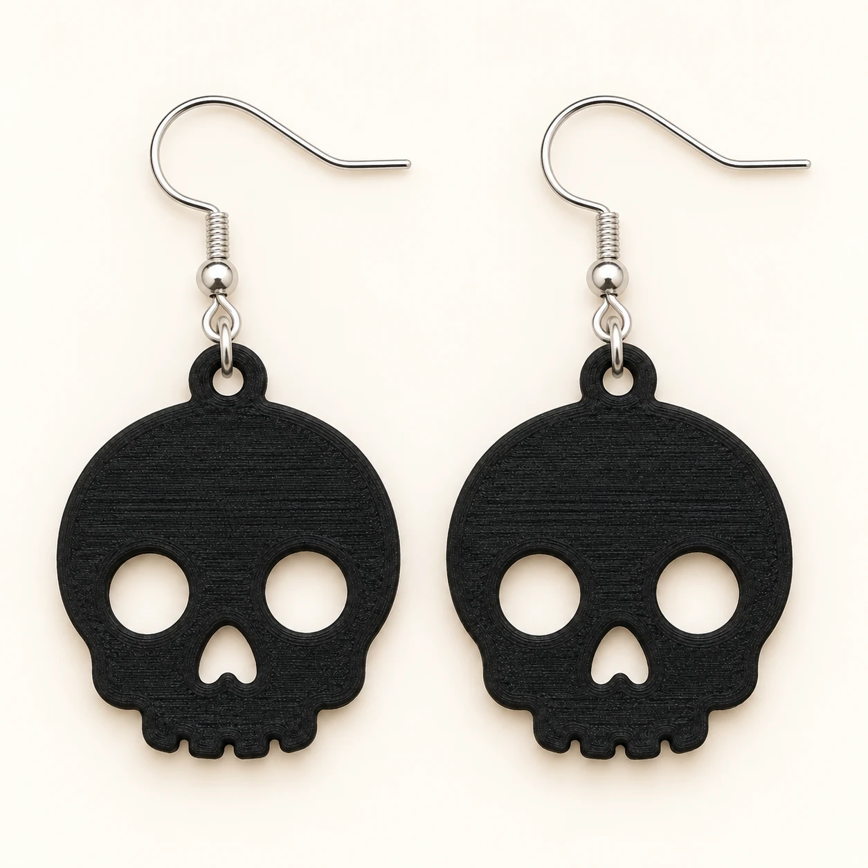 Aretes Calavera Lisa Negra - Xprésalo